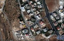 ارض 1750م مرتفعة و عالية شارعين دابوق فاخرة جدا خلف حدائق الحسين650 دينار المتر