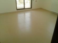 شقه للبيع بتلاع العلي ط ارضي بمدخل مستقل م200م لم تسكن فاخره بسعر مغري