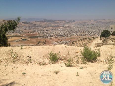 ارض للبيع في الكماليّة - تبعد كيلومتر واحد فقط عن طريق صويلح السلط - منطقة فلل هادئة و مطلة