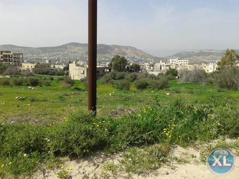 ارض للبيع في قرية ابو نصير منطقة هادئة و مطلة